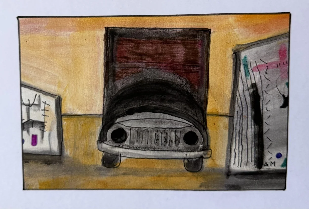 Avant d'un camion sombre dans un garage aux murs décorés, fond jaune