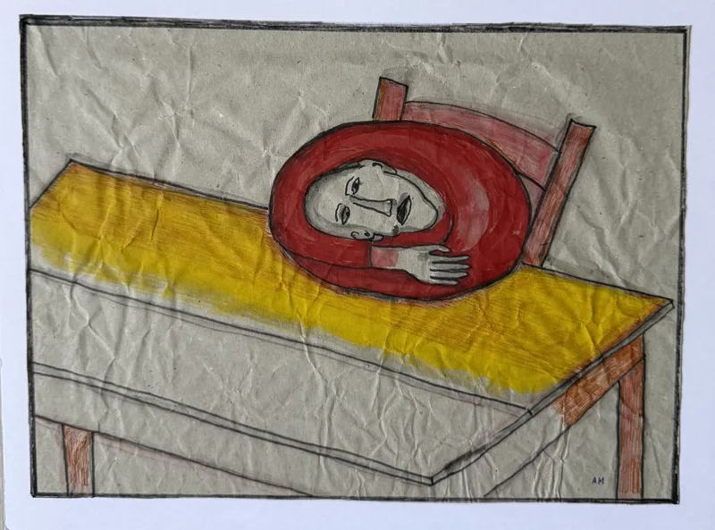 Personnage roulé en boule dans une capuche rouge, allongé sur une table jaune