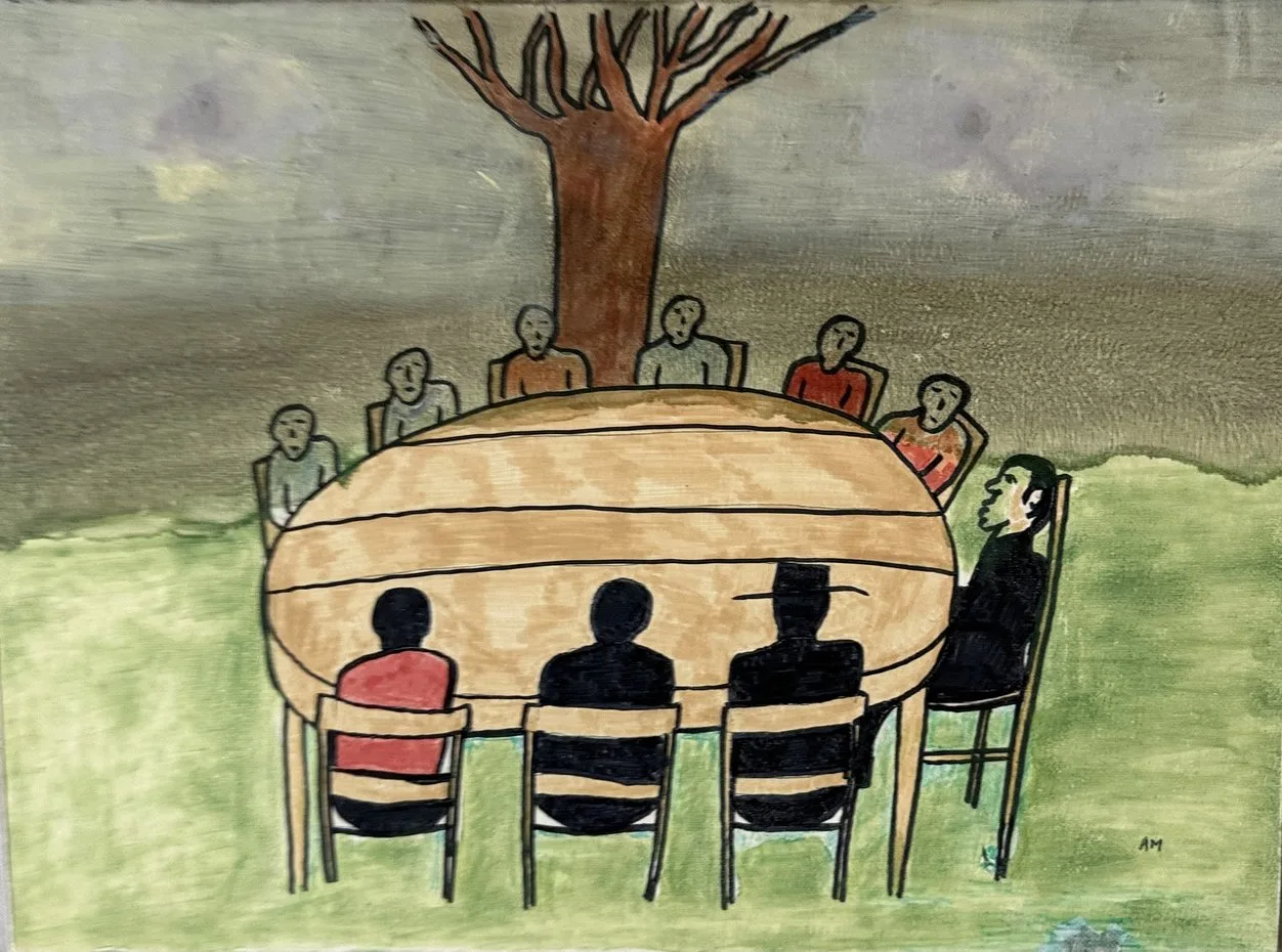 Convives en silhouette sombre autour d'une table jaune ovale sous un arbre, ciel orageux